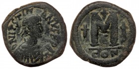 Justinian I (527-565), AE30 Follis Constantinople 
DN IVSTINIANVS PP AVG, pearl diademed, draped and cuirassed bust right 
Rev: Large M; cross to left...