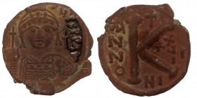 Justinian I AD 527-565. Nikomedia AE25 Half Follis or 20 Nummi 
[D N IVSTINI]ANVS P P AVG, helmeted and cuirassed bust facing, holding globus cruciger...