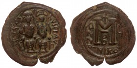 Justin II with Sophia (565 - 578), AE32 Follis, Nicomedia, 
D N IVSTINVS PP V, Justin and Sophia seated facing side by side on double throne.
Rev: Lar...