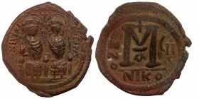 Justin II, with Sophia (565-578) AE31 Follis, Nicomedia, RY 6 = 571/2. 
D N IVSTINVS P P AVG Justin II, holding globus cruciger in his right hand, and...