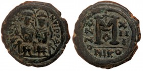 Justin II, 565-578. AE29 Follis , struck during the last year of their rule, Nicomedia, 1st officina (A), Year 13 = 577/8. 
D N IVSTINVS P P AVG Justi...