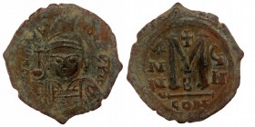Maurice Tiberius AD 582-602. Constantinople AE31 Follis 
D N MAVRI TIЬЄRI P P AV, Helmeted and cuirassed bust facing, holding globus cruciger and shie...