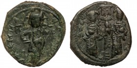 Constantine X Ducas and Eudocia AD 1059-1067. Constantinople Follis AE26
Christ standing facing on footstool, wearing nimbus and holding Gospels
Rev: ...