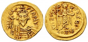 Phocas. Solidus. 607-610 AD. Constantinople. (Sear-620). Anv.: ∂ N FOCAS PЄRP AVI, draped and cuirassed bust facing, holding globus cruciger, wearing ...