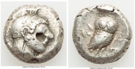 ATTICA. Athens. Ca. 510/500-480 BC. AR tetradrachm (22mm, 17.65 gm, 1h). Fine, flan flaw. Head of Athena right, hair in straight braids along brow lin...