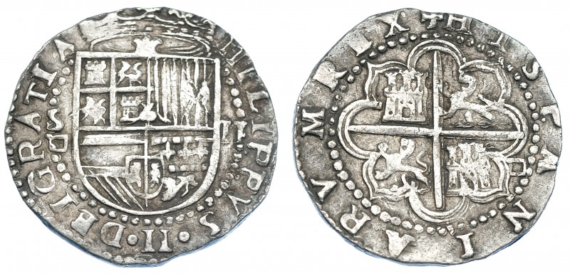 FELIPE II. 2 reales. S/F. Sevilla. Marca de ensayador de Melchor Damián en anv. ...