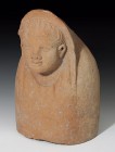 ETRURIA. Busto votivo de niño (III-II a.C.). Terracota. Altura 29,8 cm. Ex. Bonhams 28 de noviembre de 2019, lote 85.