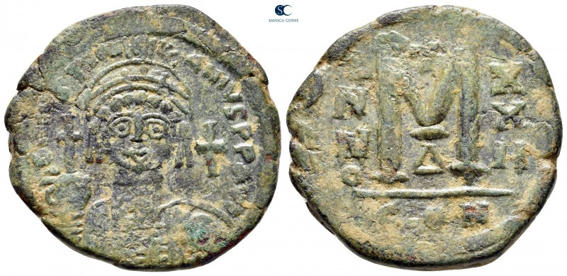 Justinian I AD 527-565. Constantinople
Follis or 40 Nummi Æ

33 mm, 17,92 g
...