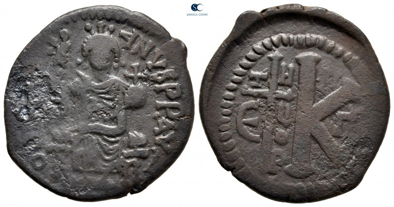 Justinian I AD 527-565. Theoupolis (Antioch)
Half Follis or 20 Nummi Æ

27 mm...