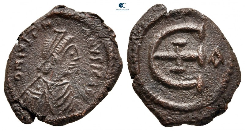 Justinian I AD 527-565. Theoupolis (Antioch)
Pentanummium Æ

16 mm, 2,44 g
...