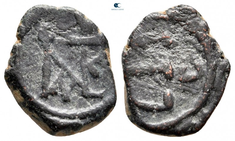 Justin II AD 565-578. Constantinople
Pentanummium Æ

16 mm, 2,05 g



ver...