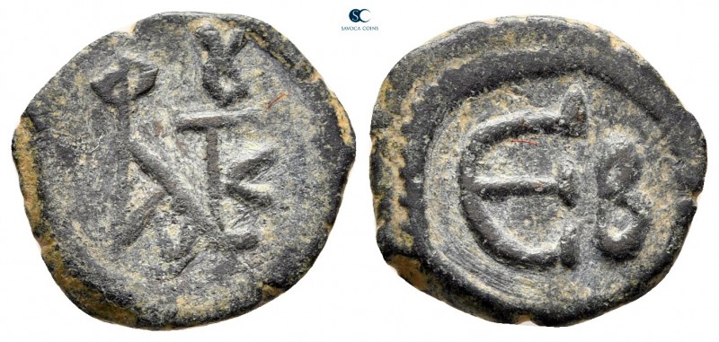 Justin II AD 565-578. Constantinople
Pentanummium Æ

15 mm, 1,61 g



ver...