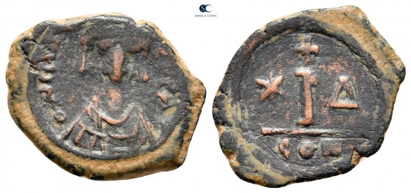 Maurice Tiberius AD 582-602. Constantinople
Decanummium Æ

20 mm, 2,96 g

...