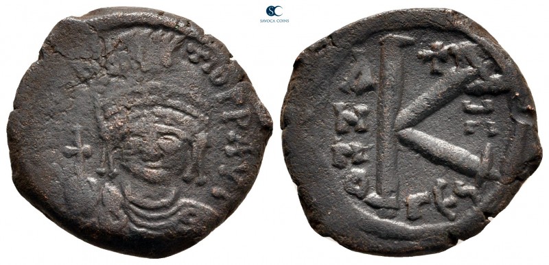 Maurice Tiberius AD 582-602. Thessalonica
Half Follis or 20 Nummi Æ

20 mm, 4...