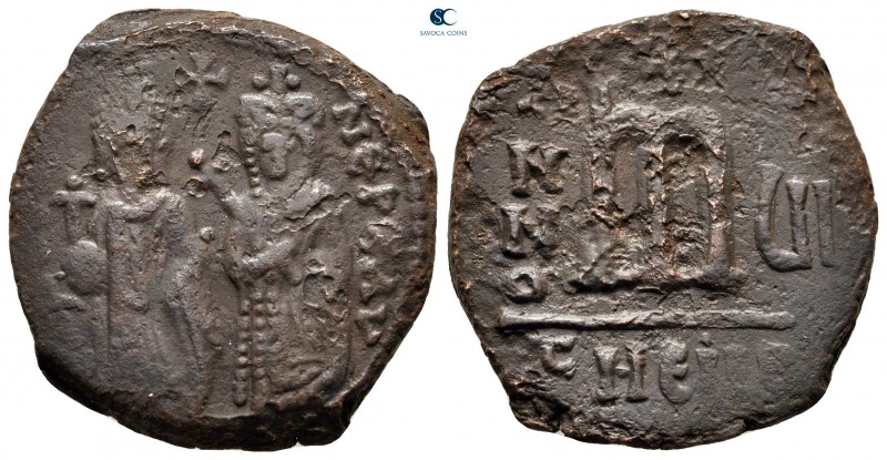 Phocas, with Leontia AD 602-610. Theoupolis (Antioch)
Follis or 40 Nummi Æ

2...