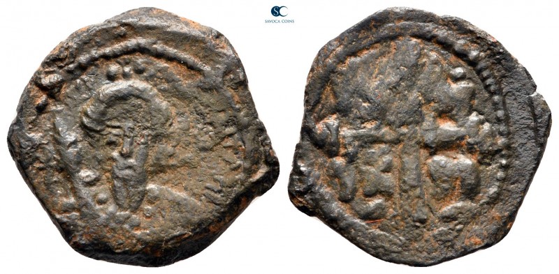 Tancred, regent AD 1101-1112. Antioch
Follis Æ

19 mm, 3,26 g



very fin...