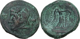 Greek Italy. Northern Apulia, Ausculum. AE 20 mm. c. 240 BC. Obv. Head of Herakles left, wearing lion skin, club on shoulder. Rev. AYCKΛA. Nike standi...