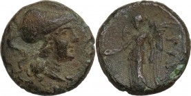 Greek Italy. Southern Apulia, Rubi. AE 11 mm. 300-225 BC. Obv. Head of Athena right, wearing crested Corinthian helmet. Rev. Nike standing left, holdi...