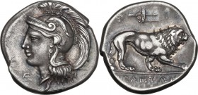 Greek Italy. Northern Lucania, Velia. AR Didrachm, c. 300-280 BC. Obv. Head of Athena left, wearing Attic helmet decorated with dolphin; Φ on neck-gua...