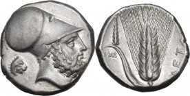 Greek Italy. Southern Lucania, Metapontum. AR Stater, c. 340-330 BC. Obv. Helmeted head of Leukippos right; small lion's head behind; [monogram below ...
