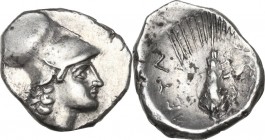 Greek Italy. Southern Lucania, Metapontum. AR Diobol. Circa 325-275 BC. Obv. Helmeted head of Athena right. Rev. META. Ear of barley with leaf to righ...
