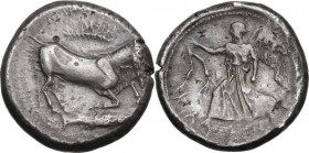 Sicily. Katane. AR Tetradrachm, c. 465-450 BC. Obv. The river god Amenanos as a bearded, man-headed bull crouching right; branch above, fish below. Re...