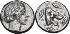 Sicily. Leontini. AR Tetradrachm, 460-450 BC. Obv. Laureate head of Apollo right. Rev. LEO-N-TI-NO-N. Head of roaring lion right; four barley grains a...