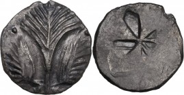 Sicily. Selinos. AR Didrachm, c. 540-515 BC. Obv. Selinon leaf; pellets to upper right and left, pellets flanking stem. Rev. Incuse square divided int...