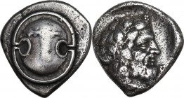 Continental Greece. Boeotia, Thebes. AR Stater, 425-400 BC. Obv. Boeotian shield; club across top half. Rev. Wreathed head of Dionysos right in incuse...