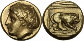 Greek Asia. Lesbos, Mytilene. EL Hekte, c. 412-378 BC. Obv. Head of Ariadne left, hair in sakkos decorated with three grape bunches. Rev. Lion, with s...