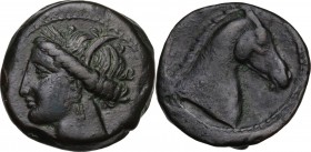 Punic Sardinia. AE 20 mm. Circa 300-264 BC. Uncertain mint. D/ Wreathed head of Kore left, wearing triple-pendant earring. R/ Horse's head right. Lull...