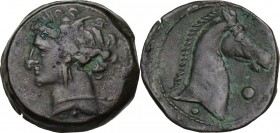 Punic Sardinia. AE 20 mm. Circa 300-264 BC. Uncertain mint. D/ Wreathed head of Kore left, wearing triple-pendant earring; on cheek, two incuse pellet...