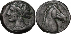 Punic Sardinia. AE 19 mm. Circa 300-264 BC. Uncertain mint. D/ Wreathed head of Kore left, wearing triple-pendant earring; on cheek, incuse pellet. R/...