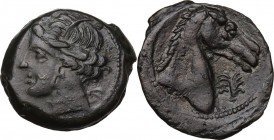 Punic Sardinia. AE 21 mm. Circa 300-264 BC. Uncertain mint. D/ Wreathed head of Kore left, wearing triple-pendant earring; behind (on hair), pellet. R...