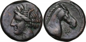 Punic Sardinia. AE 17.5 mm. Circa 300-264 BC. Uncertain mint. D/ Wreathed head of Kore left, wearing triple-pendant earring. R/ Horse's head right; be...