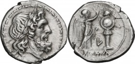 L series. AR Victoriatus, Luceria mint, c. 214-212 BC. Obv. Laureate head of Jupiter right. Bead and reel border. Rev. Victory standing right, crownin...