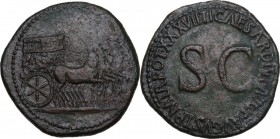 Tiberius (14-37). AE Sestertius, 35-36 AD. Obv. Empty horse-drawn quadriga right, its side panels decorated with Victory and captives. Rev. TI CAESAR ...
