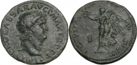 Nero (54-68). AE Dupondius, Lugdunum mint. Obv. IMP NERO CAESAR AVG P MAX TR P PP. Laureate head right. Rev. VICTORIA AVGVSTI SC. Victory walking left...
