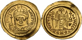 Justinian I (527-565). AV Solidus, Ravenna mint, 552-565 AD. Obv. DN IVSTINIANVS PP AVI (AV ligate). Helmeted and cuirassed bust facing, holding globu...