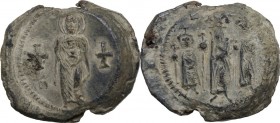 Constans II (641-668). Lead Seal, 659 - 668 AD. Obv. The Virgin, nimbate, standing facing, holding a medallion of Christ against her chest; a cross in...
