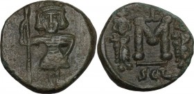 Constantine IV Pogonatus, with Heraclius and Tiberius (668-685). AE Follis. Syracuse mint. Struck 672-677. Obv. Constantine, helmeted and cuirassed, s...