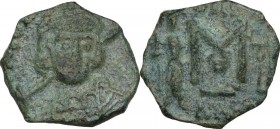 Constantine IV Pogonatus, with Heraclius and Tiberius (668-685). AE Follis, Ravenna mint. Dated RY 23 (676/7 AD). Obv. DN C[ ]. Bust three-quarter fac...