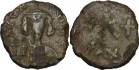 Justinian II (685-695). AE Half Follis. Struck 685-695. Sardinian mint. Obv. [IU]ƧTINIANU[S PP]. Bust facing, beardless, wearing crown and clamys and ...