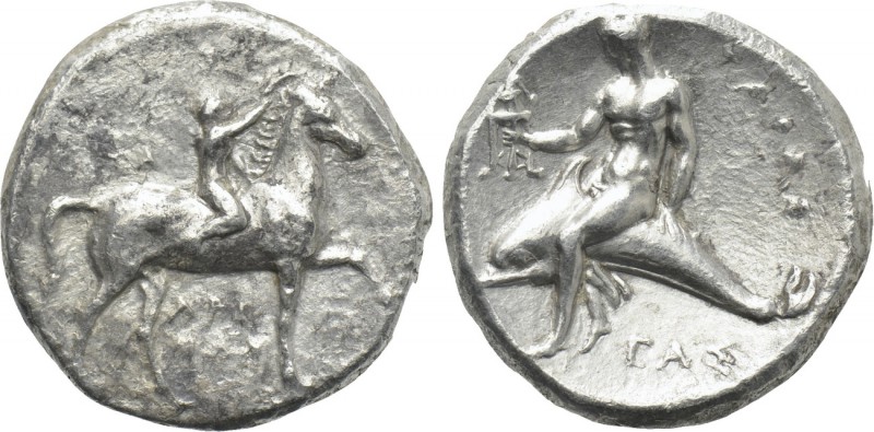 CALABRIA. Tarentum. Nomos (Circa 280 BC). 

Obv: Crowning youth on horse stand...