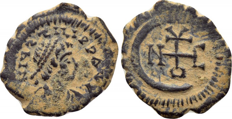 JUSTIN II (565-578). Pentanummium. Theoupolis (Antioch). 

Obv: Diademed, drap...