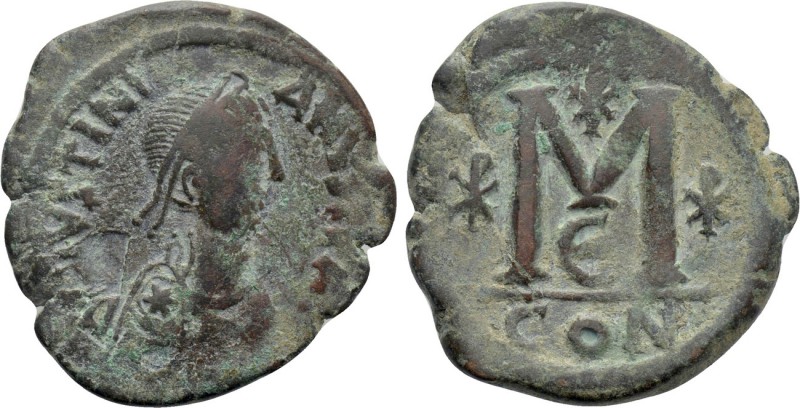 JUSTINIAN (527-565). Follis. Constantinople.

Obv: D N IVSTINIANVS P P AVG.
D...