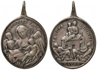 MEDAGLIE VOTIVE LAURETANE - Medaglia con la Sacra Famiglia e la traslazione - AG (g 7,56 - 26 x 30 mm)
BB