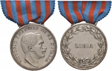 Vittorio Emanuele III (1900-1946) Medaglia Libia - Opus: S.J. - MA (g 14,00 - 31 mm) Riconio. Con nastrino
BB