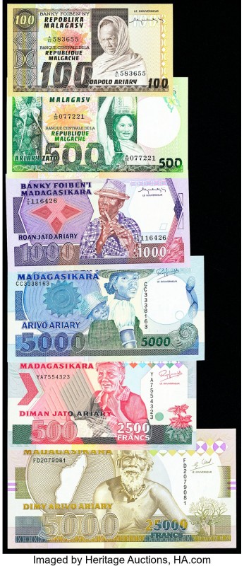 Madagascar Group of 6 Examples Crisp Uncirculated. Pick 63 has a made as wrinkle...