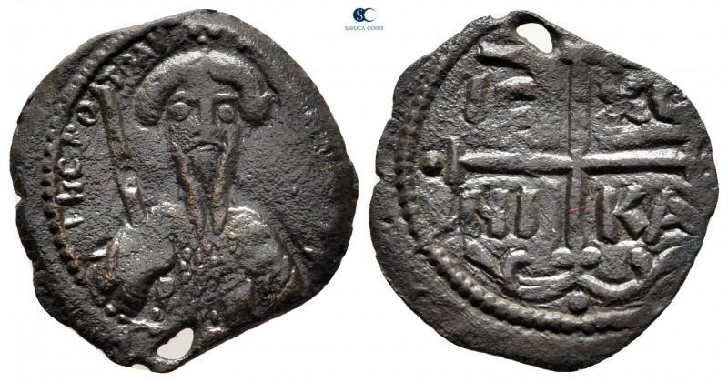 Tancred AD 1101-1103. Antioch
Follis Æ

21 mm, 2,60 g

Bust of Tancred faci...